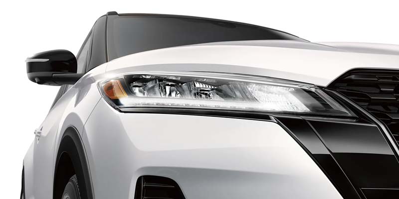 2023 Nissan Kicks driving on a rainy day