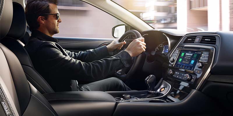A person driving a 2023 Nissan Maxima