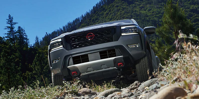 2024 Nissan Frontier driving in the mountains